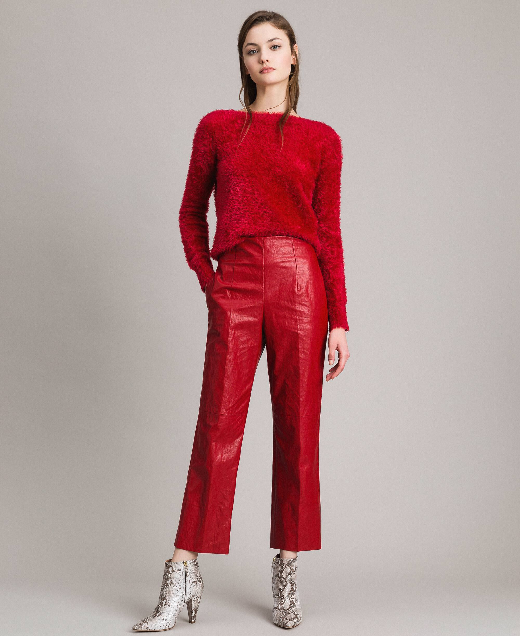 red faux leather trousers