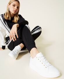 Leather trainers with rhinestone logo White Woman 212TCP140-0S
