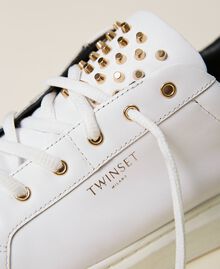 Leather trainers with studs Two-tone Optical White / Black Woman 212TCT130-04