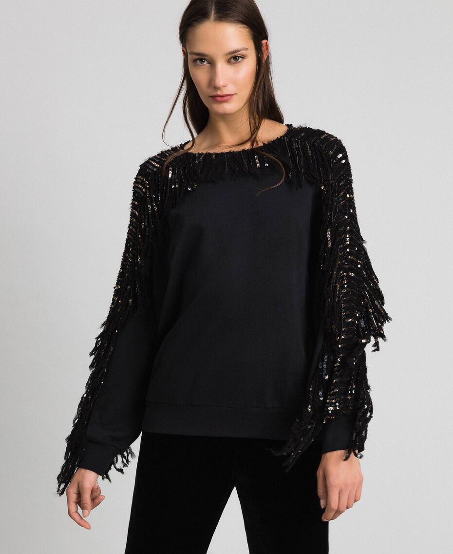 Oversize sweatshirt with sequin embroidery and fringes