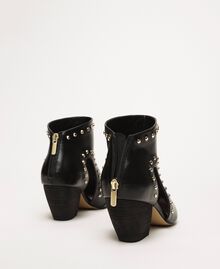 Ankle boots with cutout and studs Woman, Black | TWINSET Milano