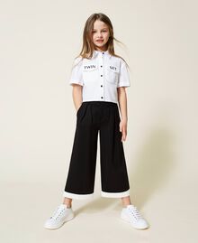 Pantalon cropped avec bas contrasté Bicolore Noir / Blanc Cassé Enfant 221GJ2232-01