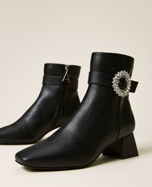 Ankle boots with strap and jewel buckle Black Woman 222ACP252-01