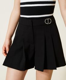 Trouser skirt with jewel logo Black Child 222GJ2160-04
