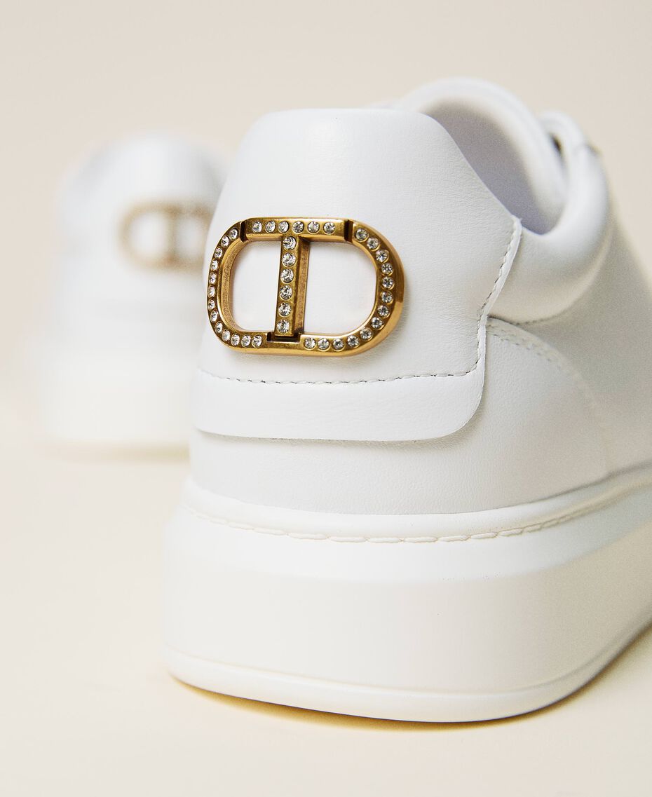 Leather trainers with rhinestone logo White Woman 212TCP140-03