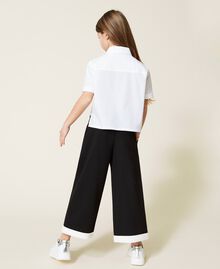 Pantalon cropped avec bas contrasté Bicolore Noir / Blanc Cassé Enfant 221GJ2232-03