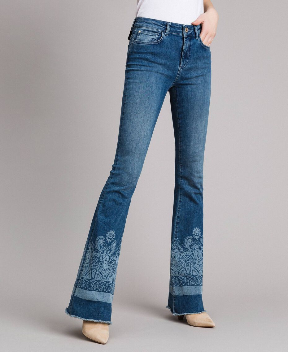 Laser pattern bell bottom jeans
