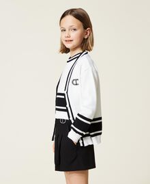 Cardigan and top with stripes Bicolour Off White / Black Child 222GJ307A-04