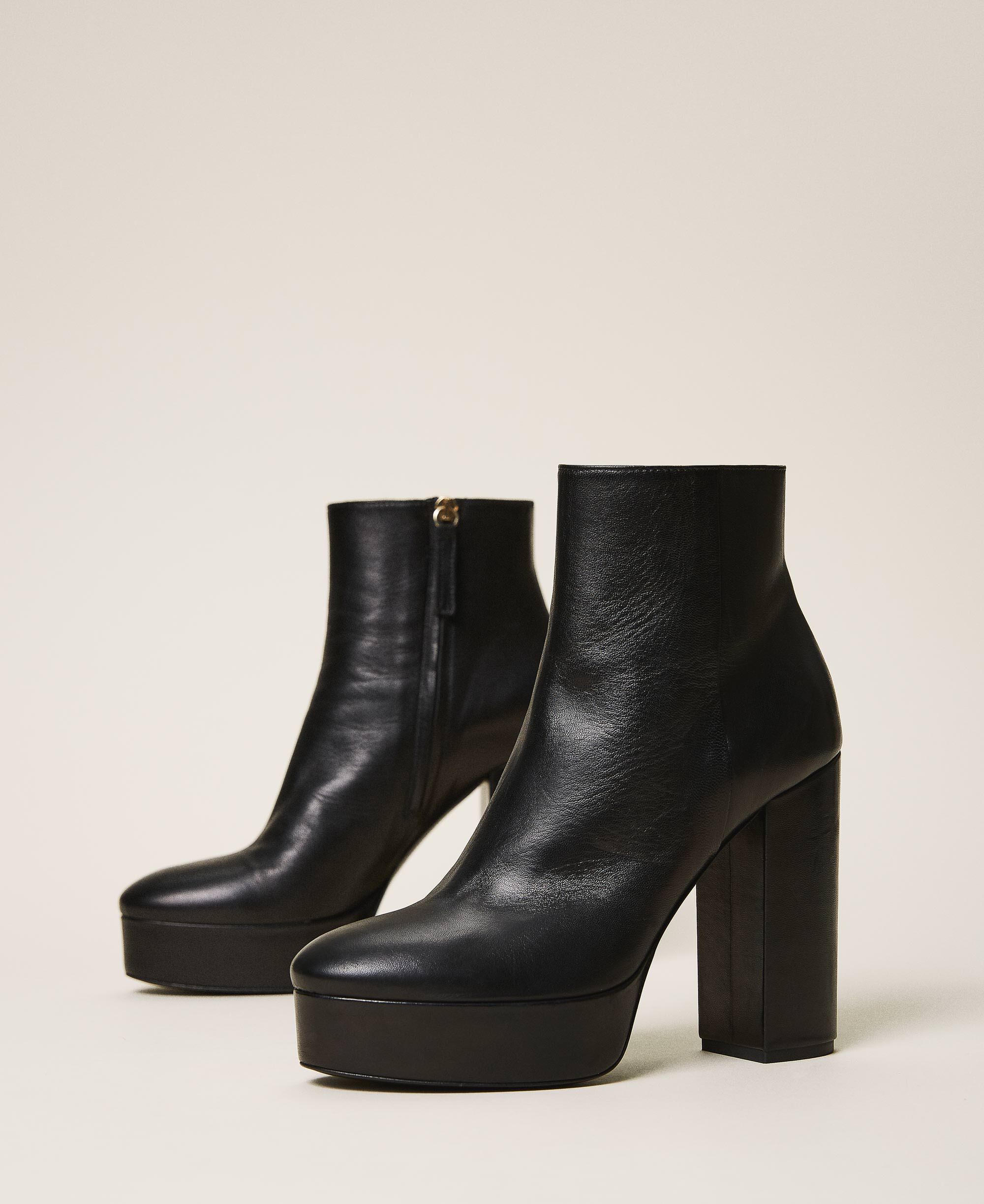 black platform heeled ankle boots