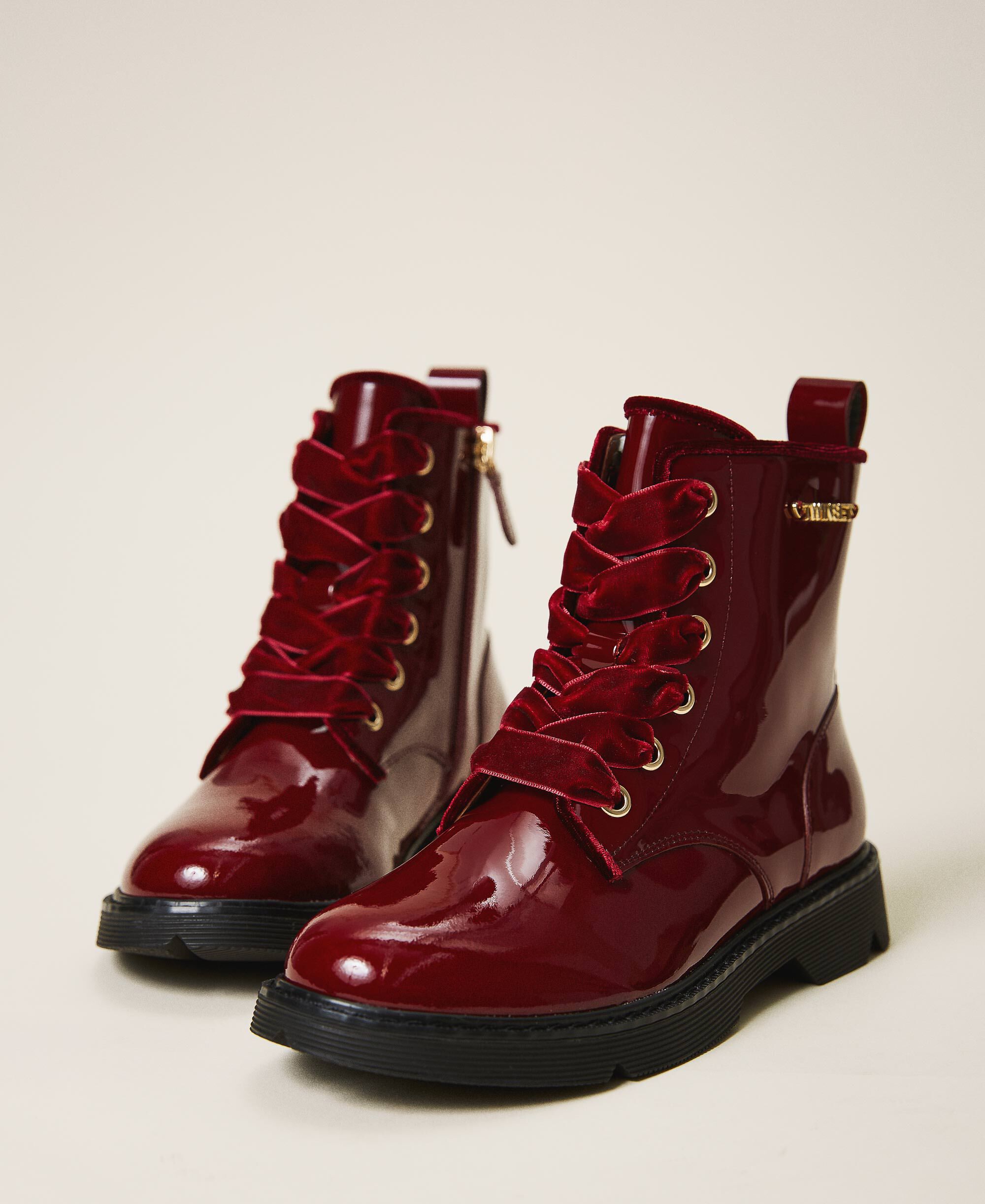 Patent leather combat boots with logo 