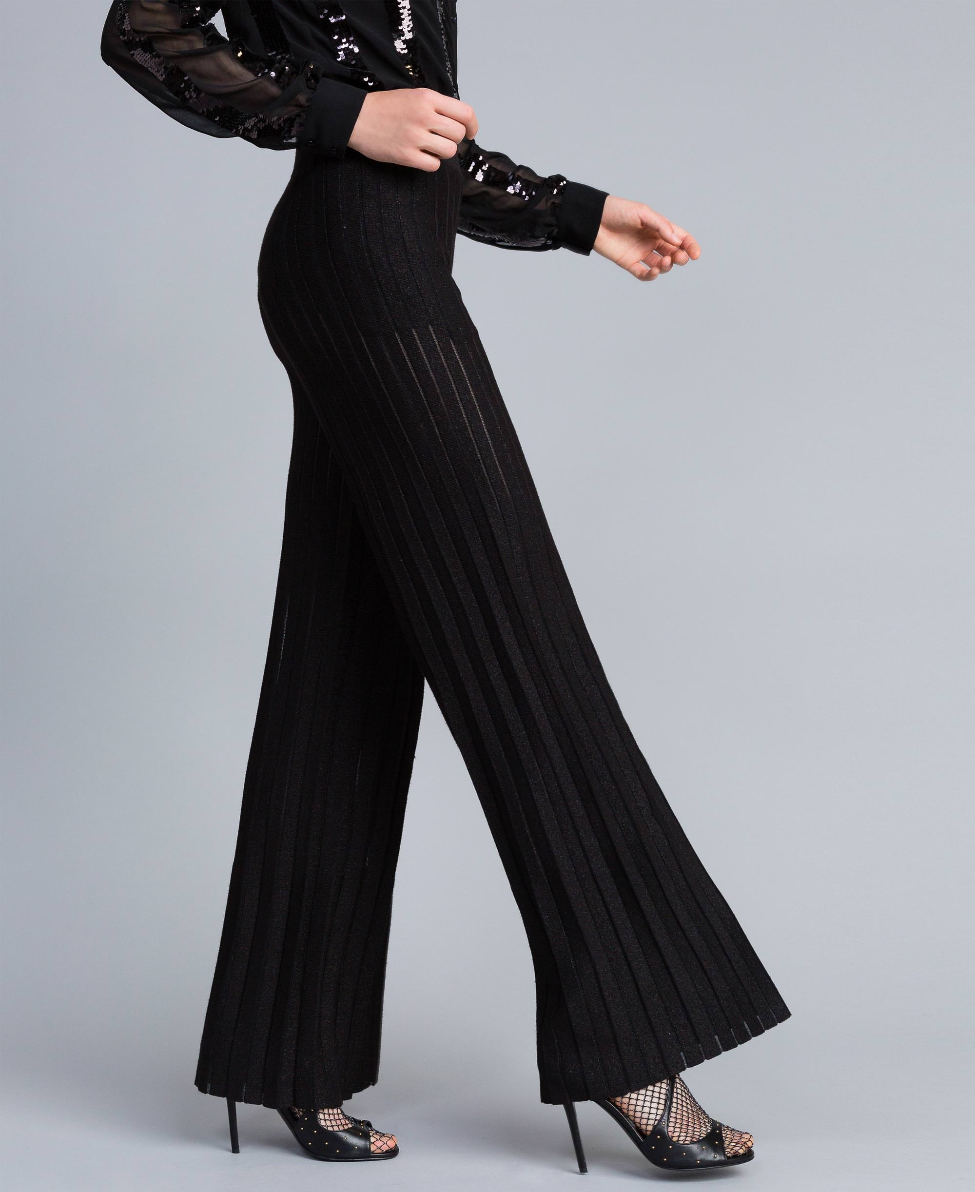 Pantaloni ampi in maglia plissé lurex