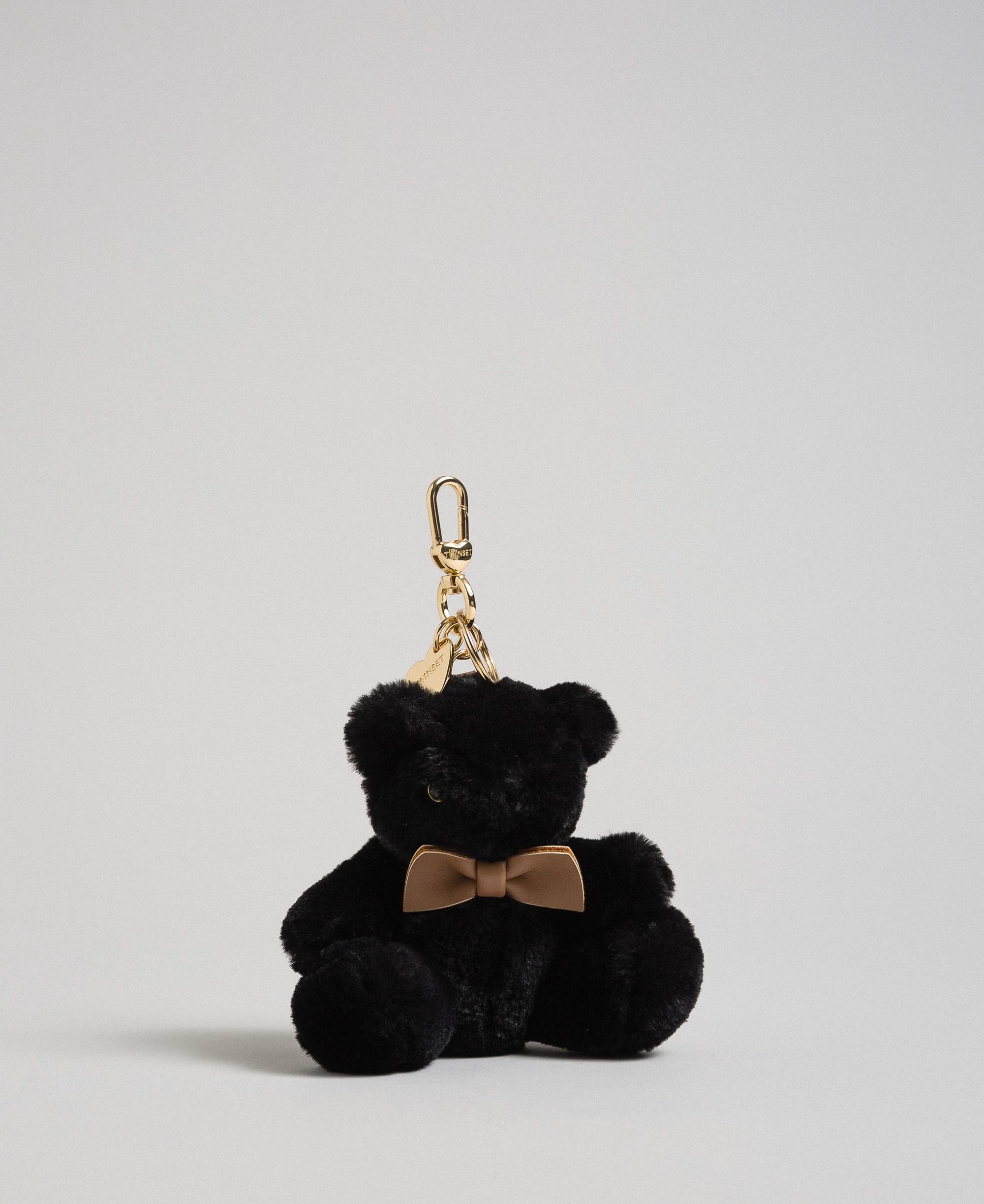 teddy bear with black bow tie