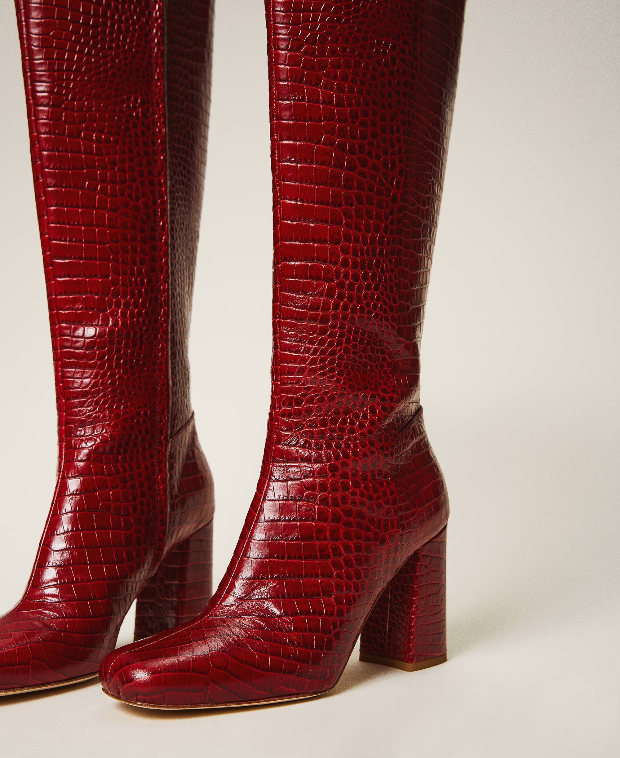 Leather boots with crocodile print 