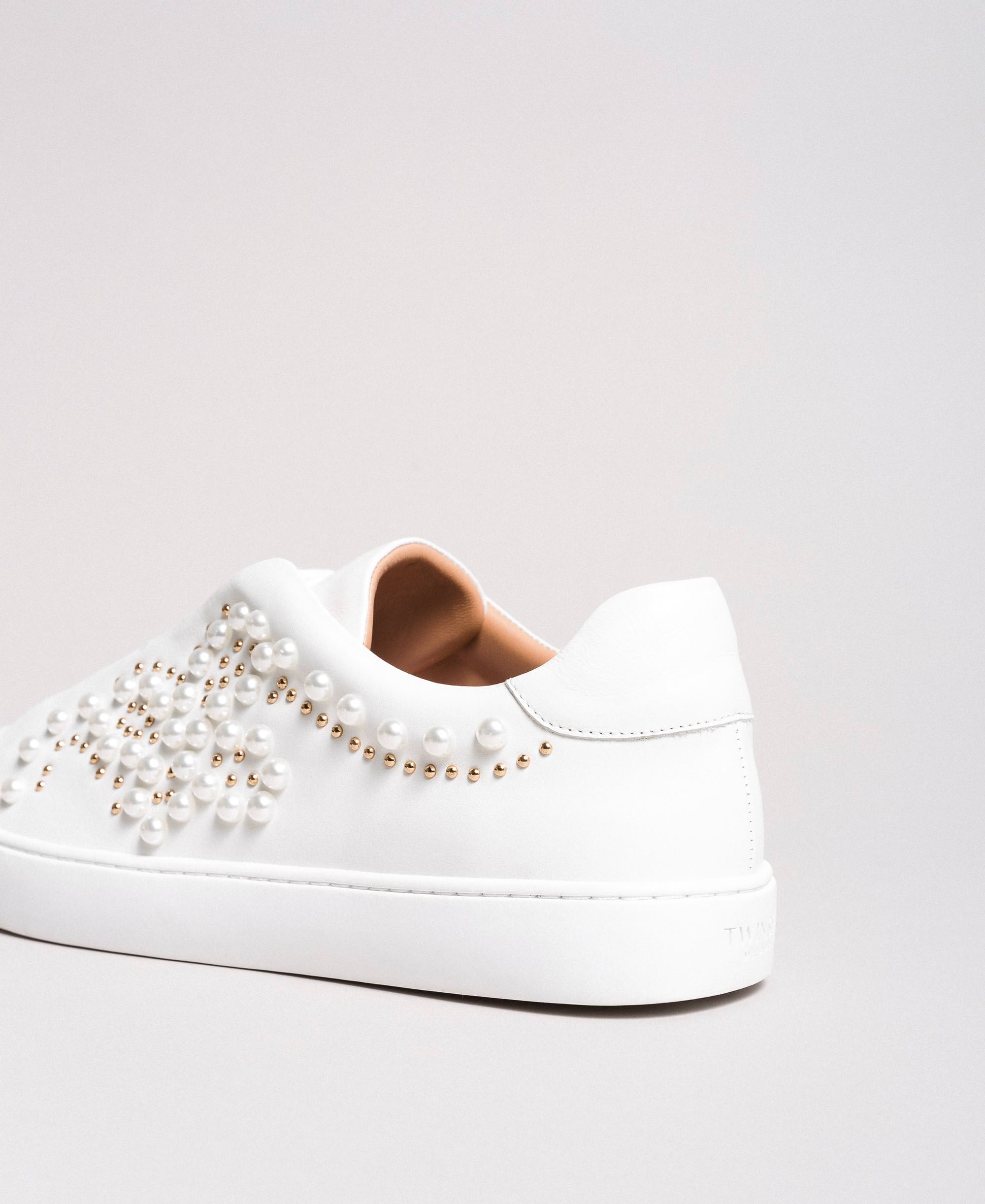 Studded leather sneakers with pearls