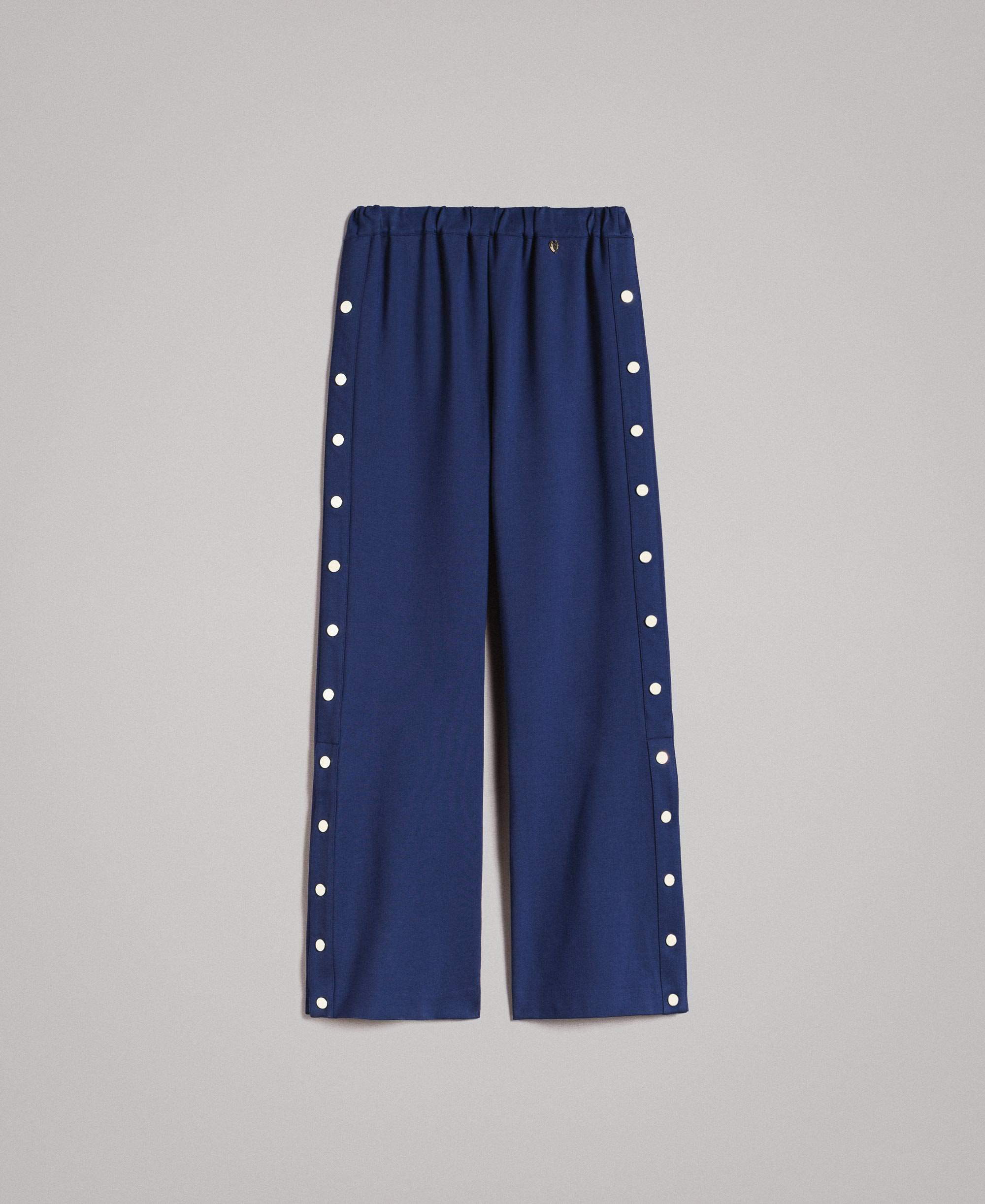 Pantaloni palazzo con spacchi e bottoni